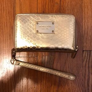 Michael kors gold snake skin wristlet